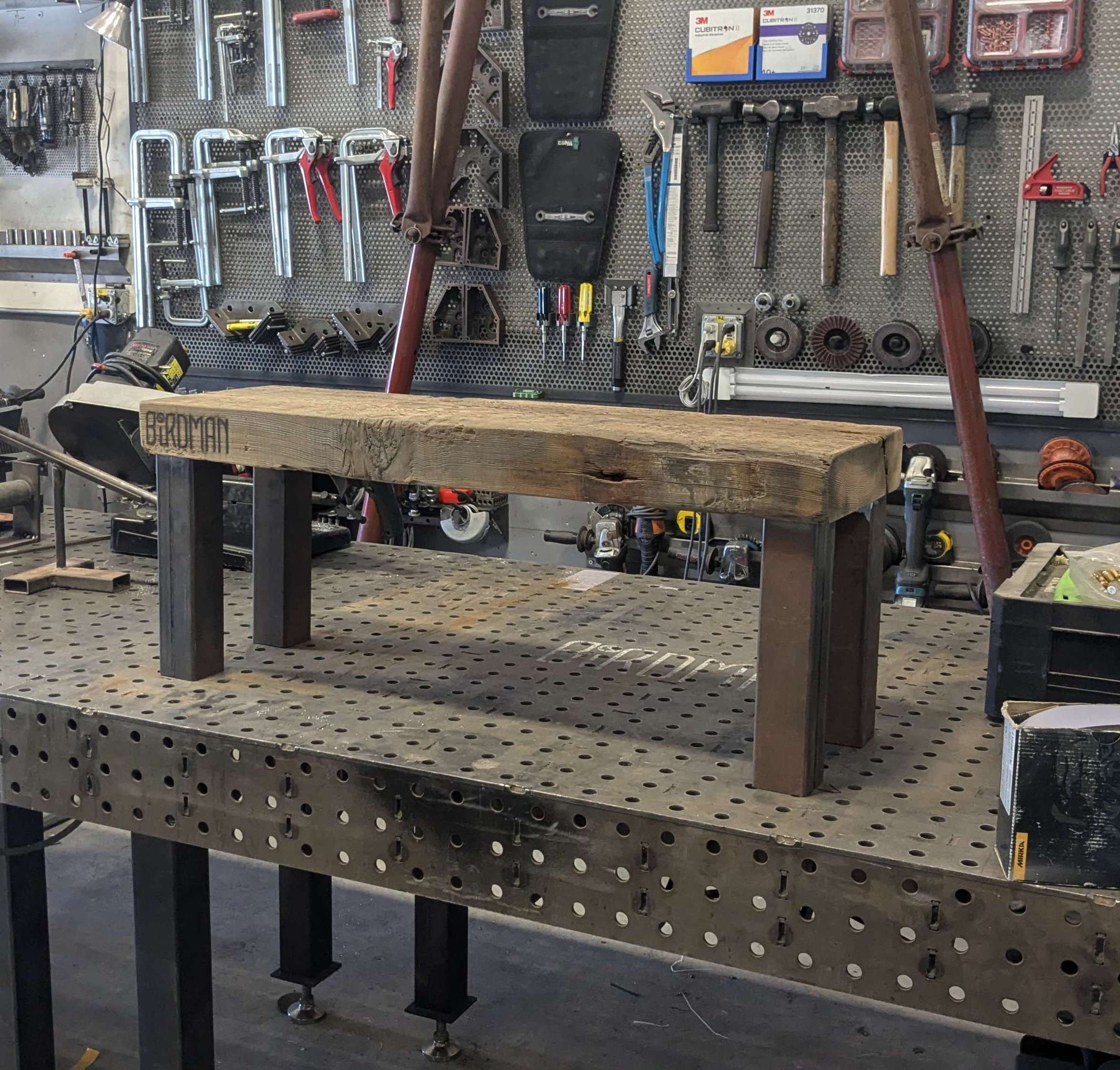 wooden bench with metal legs