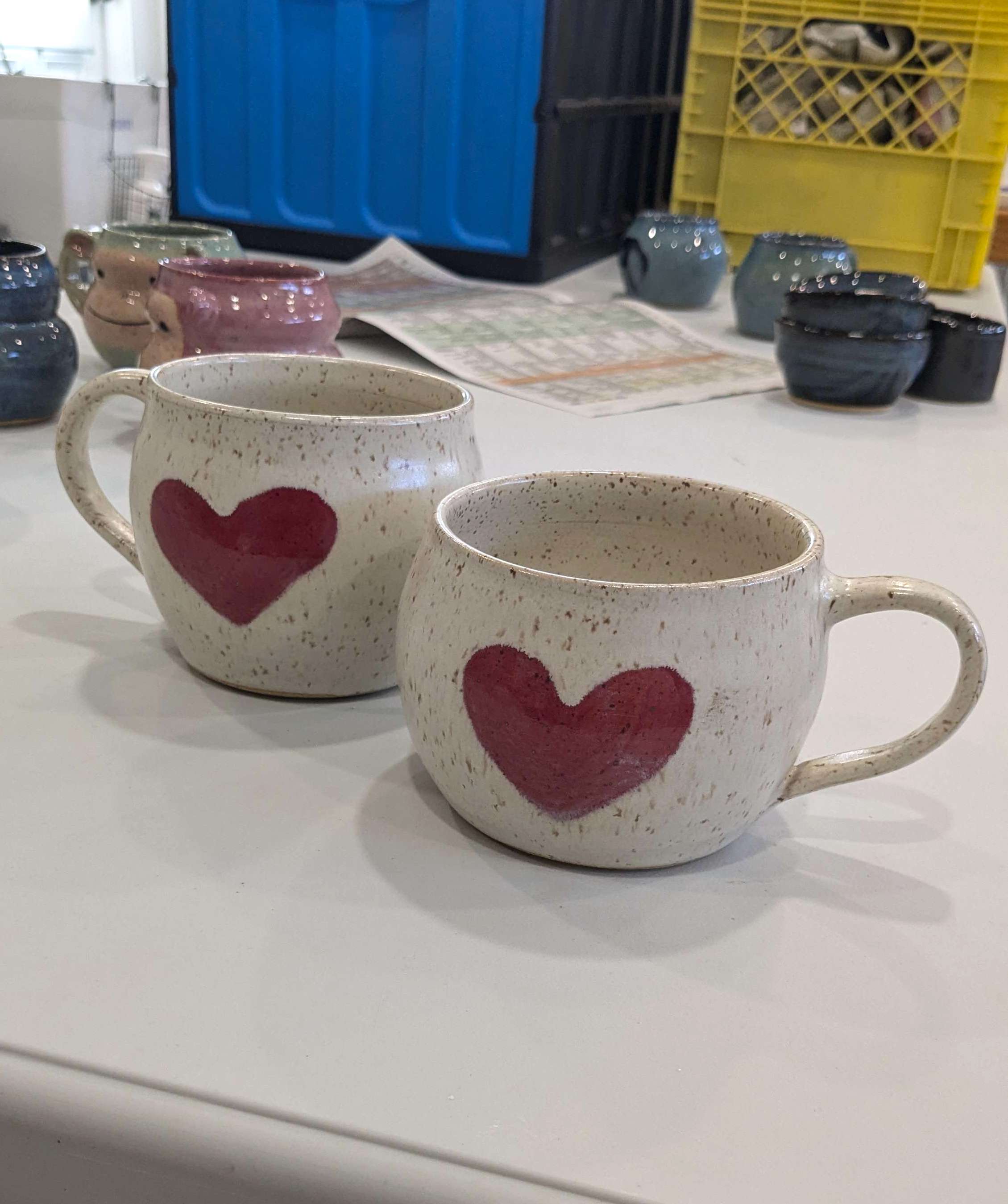 white mug with red heart