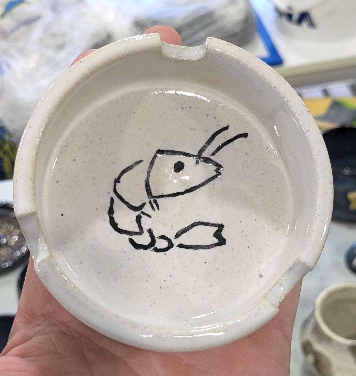 Ashtray with a shrimp on it