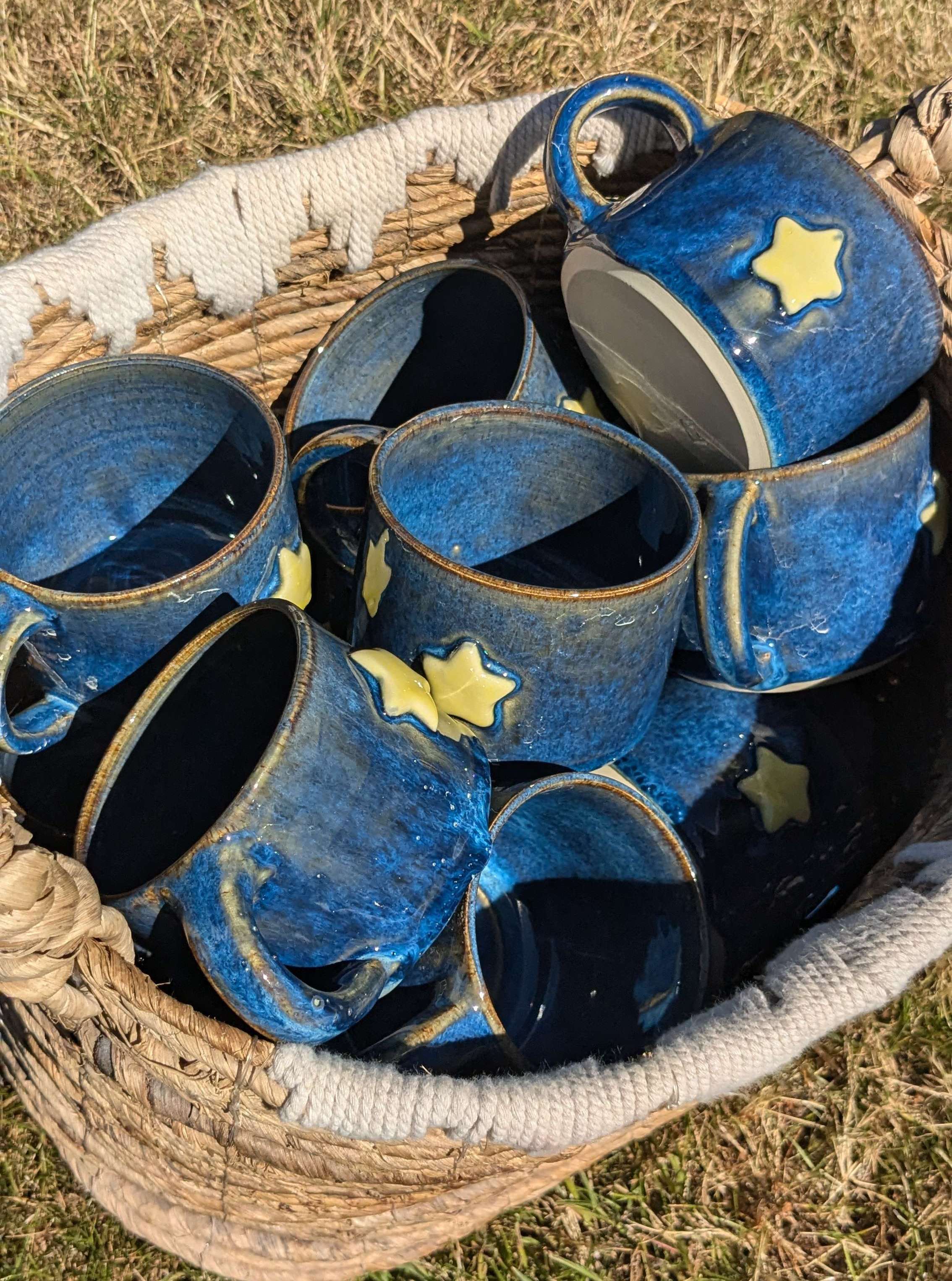 blue mugs with stars on them
